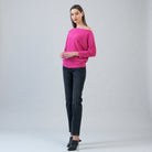 Side view of the Clara Sunwoo fuchsia plush sweater showing the dolman sleeve