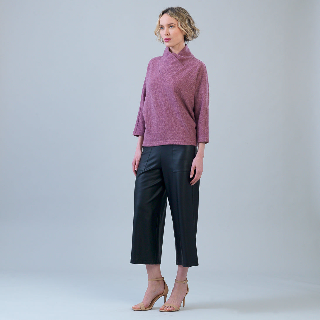 Side view of the Clara Sunwoo mauve ribbed sweater showing the drop shoulder