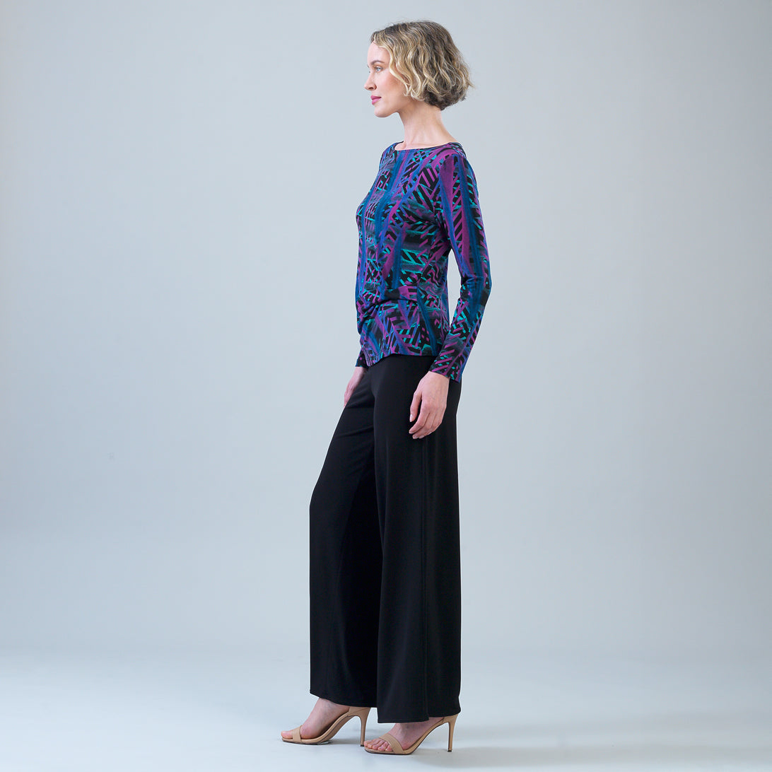 Side view of the Clara Sunwoo track stripe top showing the side ruching