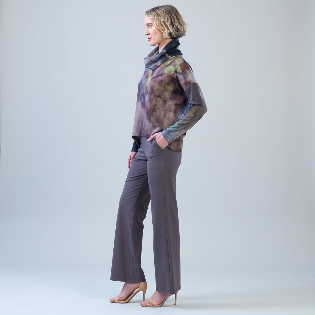 Side view of the Clara Sunwoo watercolor print sweater showing the tipped hem