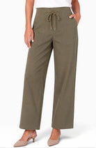 Model wearing Hunter Green wide-leg crop trouser with drawstring waist, front view styled with heeled mules