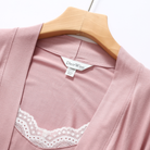 Close-up of the lace trim on the dusty rose robe and slip