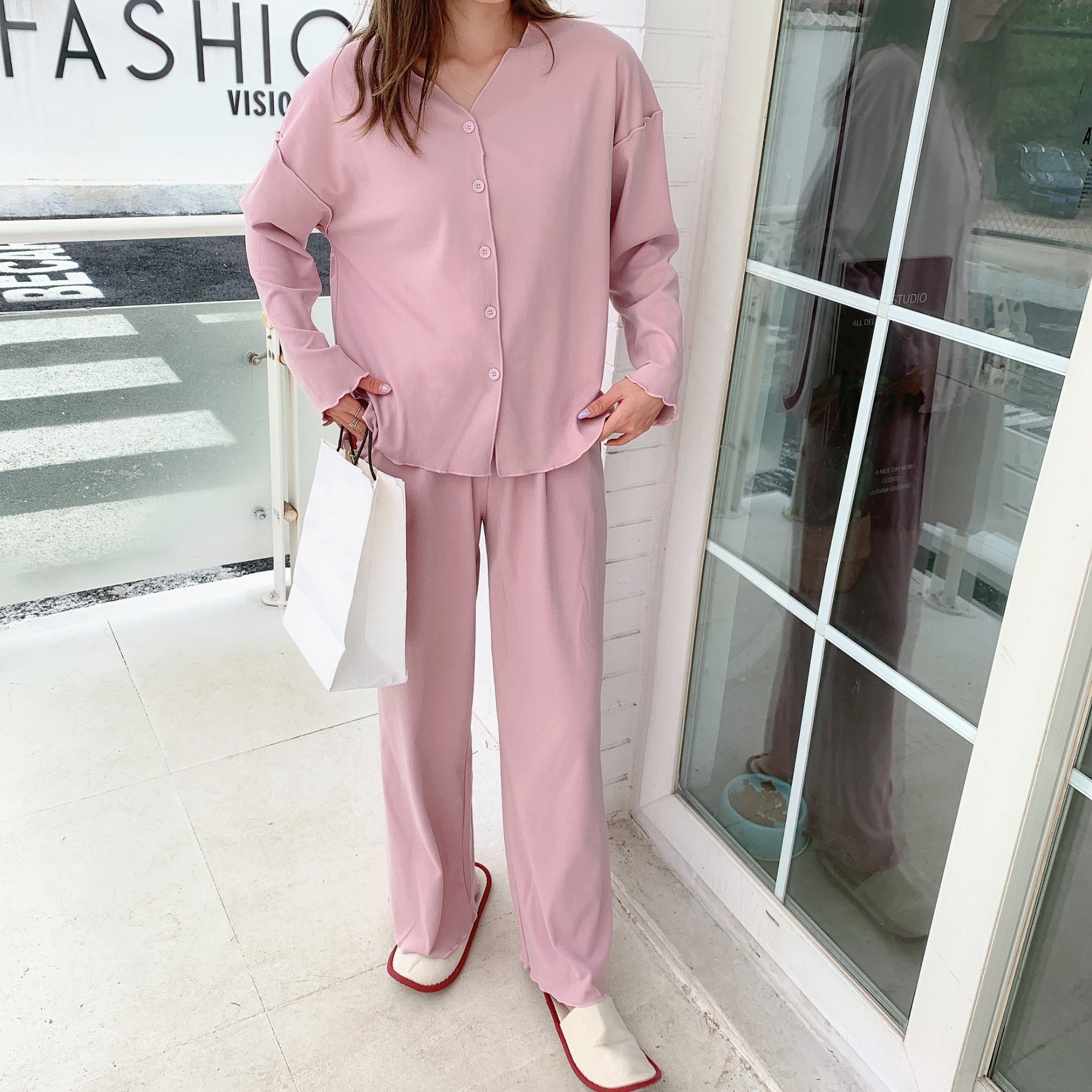 Woman wearing the dusty pink modal pajama set, full length