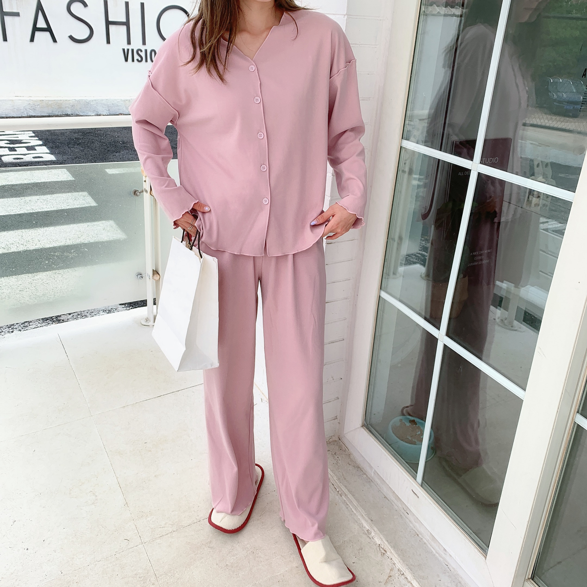 Woman wearing the dusty pink modal pajama set, full length