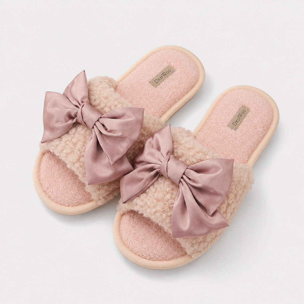 Rose pink plush slide slippers with oversized satin bows
