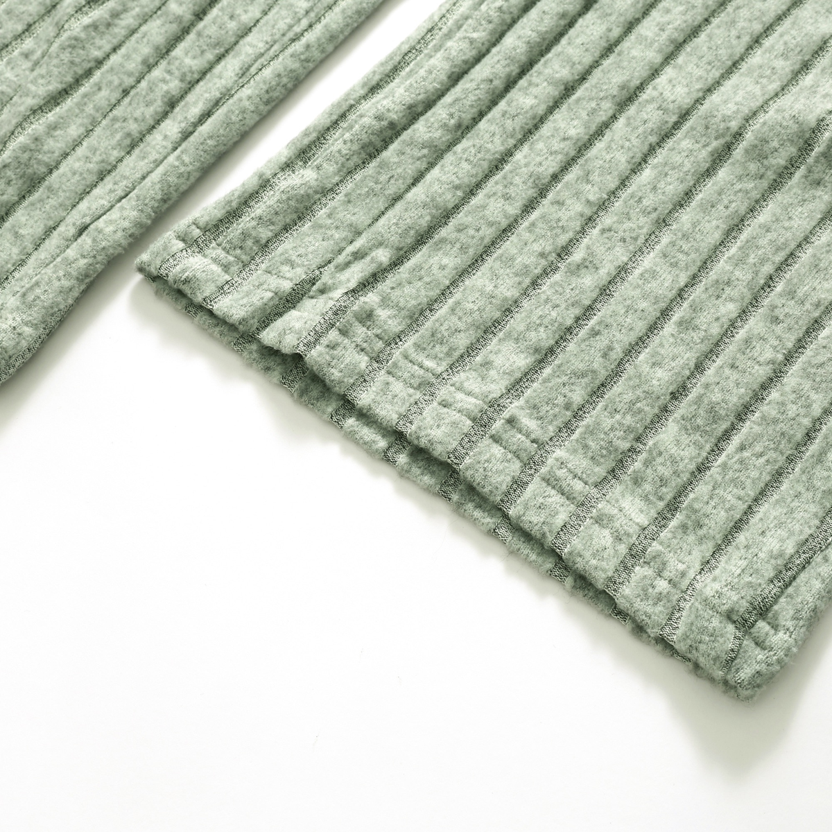 Close-up of the sage ribbed knit pajama fabric
