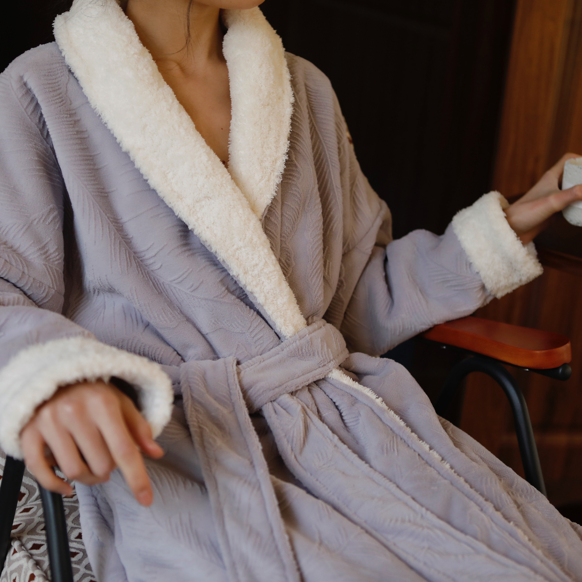 Sherpa cuff and embossed fabric detail on the lavender robe