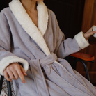 Sherpa cuff and embossed fabric detail on the lavender robe