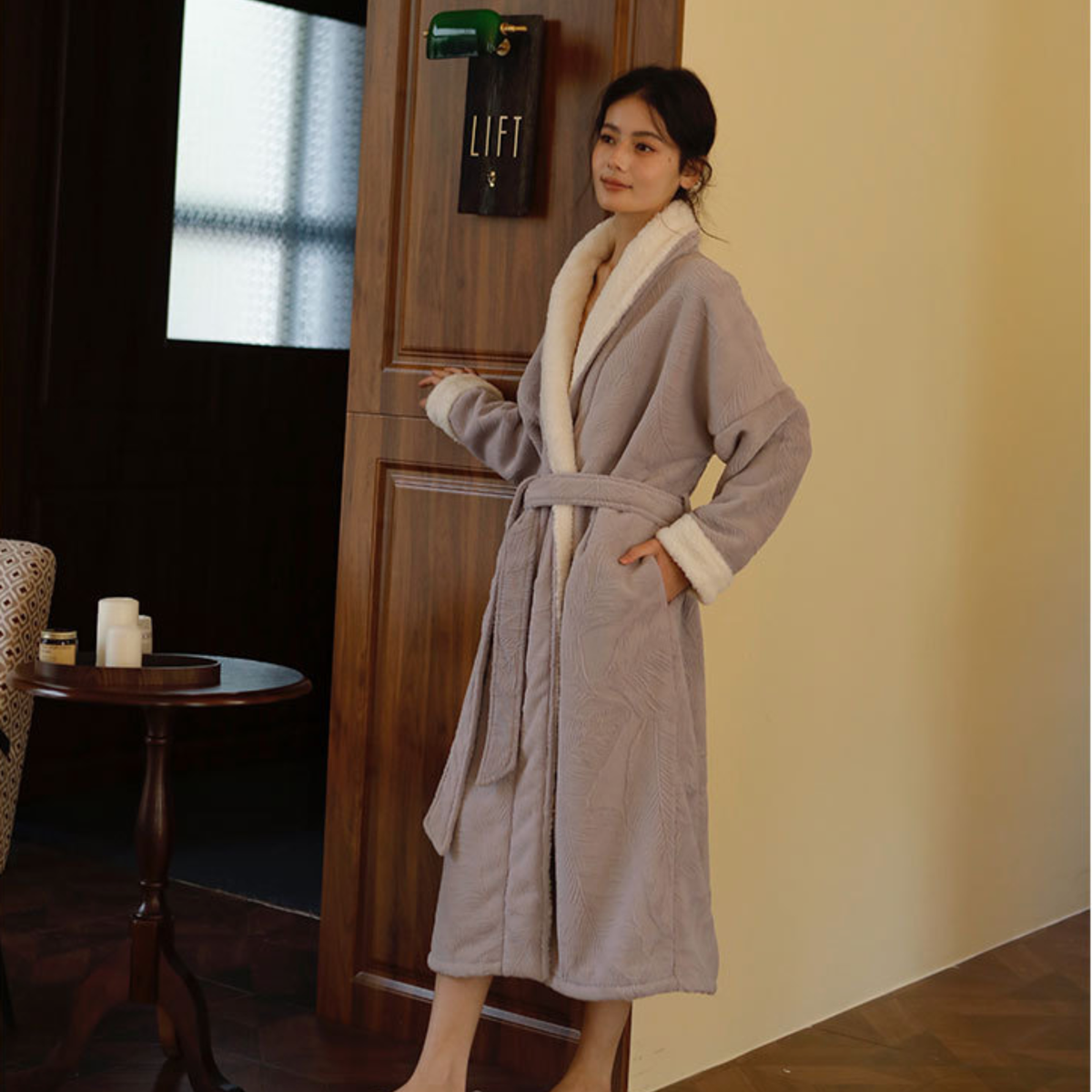 Woman wearing the lavender sherpa lined robe, full length