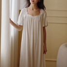 White viscose nightdress with lace square neckline and flutter sleeves, full length