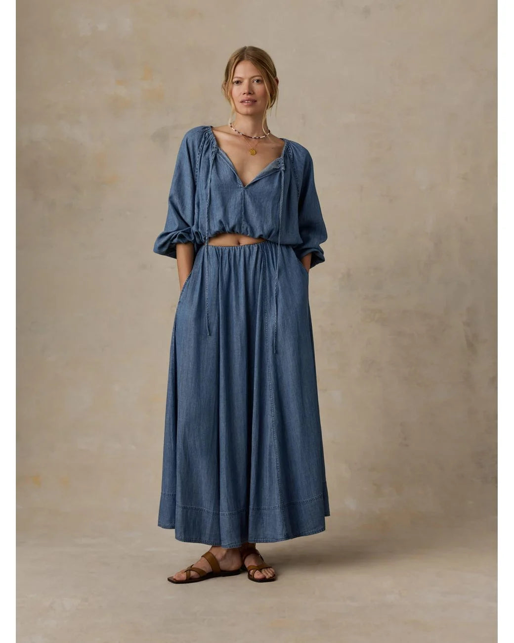 Faherty Brand Tried & True Chambray Nera Skirt in River Mist Wash — women's flowy maxi skirt styled with matching chambray top and leather sandals
