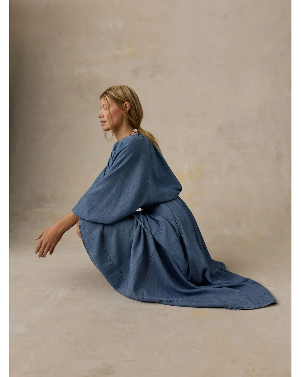 Faherty Brand Tried & True Chambray Nera Skirt lifestyle shot — women's sustainable maxi skirt in River Mist Wash showing full drape and movement

