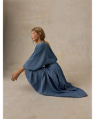 Faherty Brand Tried & True Chambray Nera Skirt lifestyle shot — women's sustainable maxi skirt in River Mist Wash showing full drape and movement
