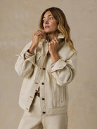Faherty Driftwood Denim Jacket in Almond Milk, styled lifestyle view