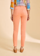 FDJ Olivia Slim Ankle jeans in cantaloupe, back view showing patch pockets