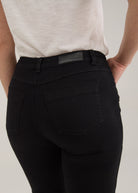 Close-up of FDJ Petite Olivia Straight Leg Jeans in black, back pocket and waistband detail