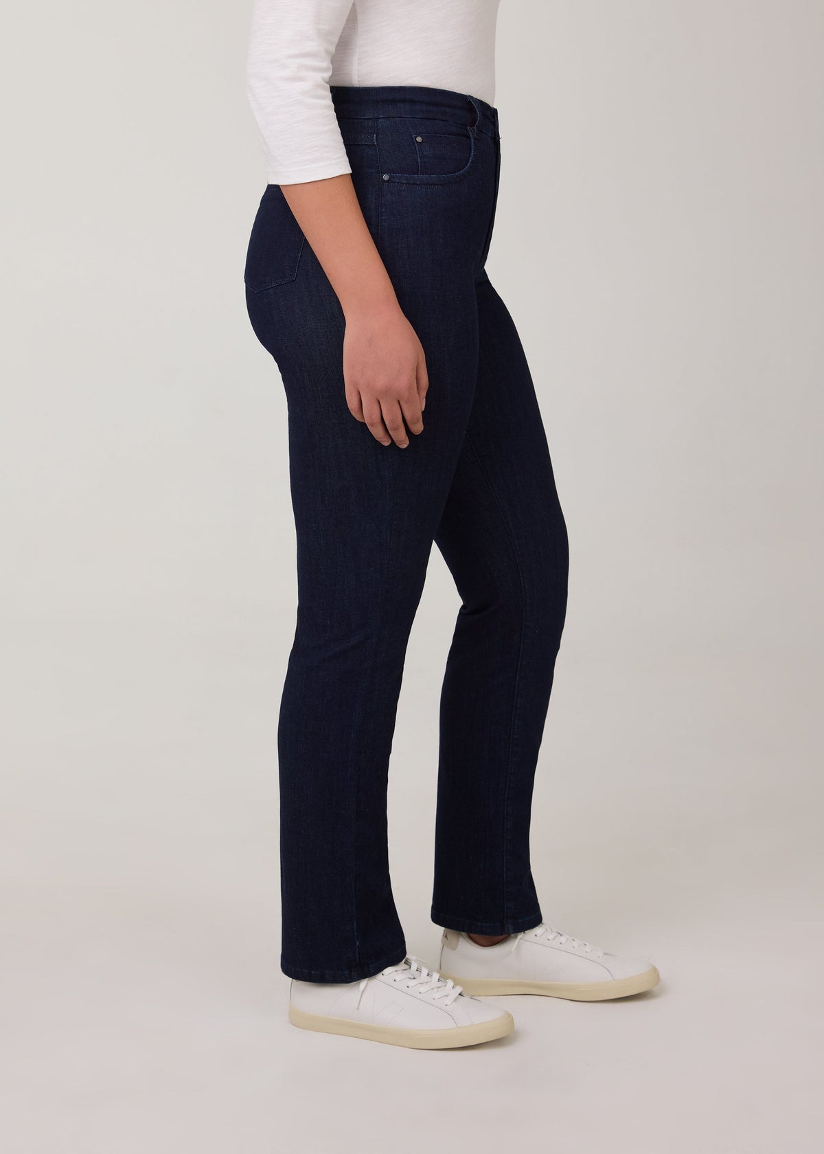 FDJ Petite Suzanne Straight Leg Jeans in Pleasant dark wash, side view with white sneakers
