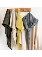 Cable knit triangle scarves in assorted colors