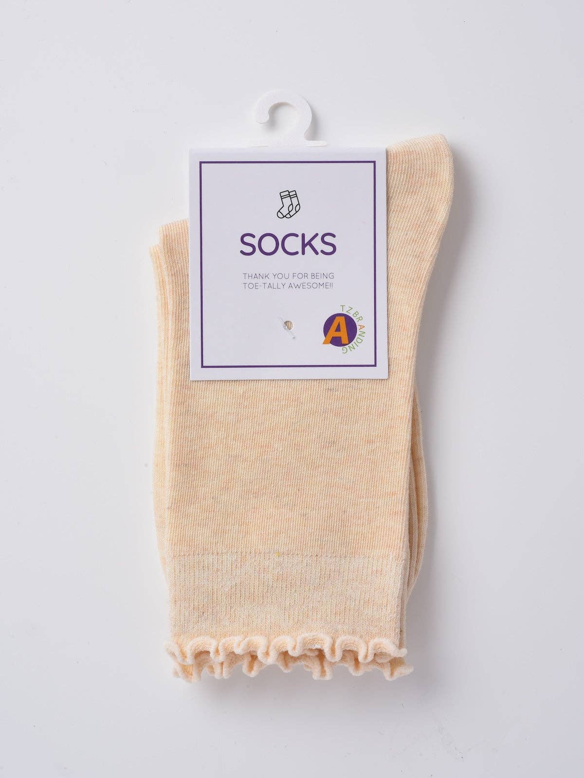 Beige ribbed crew sock with lettuce edge