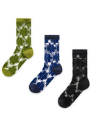 Flocked floral sheer crew socks in green, blue, and black