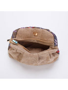 Open floral sequin clutch showing the lined interior