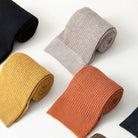 Close-up of the soft knit texture on the winter knee socks