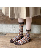 Plaid winter crew socks worn with a skirt