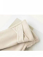 Close-up of the cuff detail on the warm touchscreen gloves