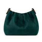 German Fuentes genuine leather crossbody bag with cowhide texture in petrol green
