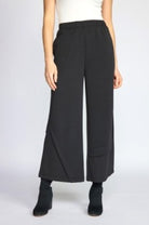 Habitat Featherlux Knit Crossroads Pant in black, a wide-leg cropped knit pant, styled with black ankle boots