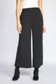 Habitat Featherlux Knit Crossroads Pant in black, a wide-leg cropped knit pant, styled with black ankle boots