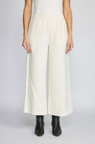 Habitat Featherlux Knit Crossroads Pant in ivory, a wide-leg cropped knit pant, styled with black ankle boots