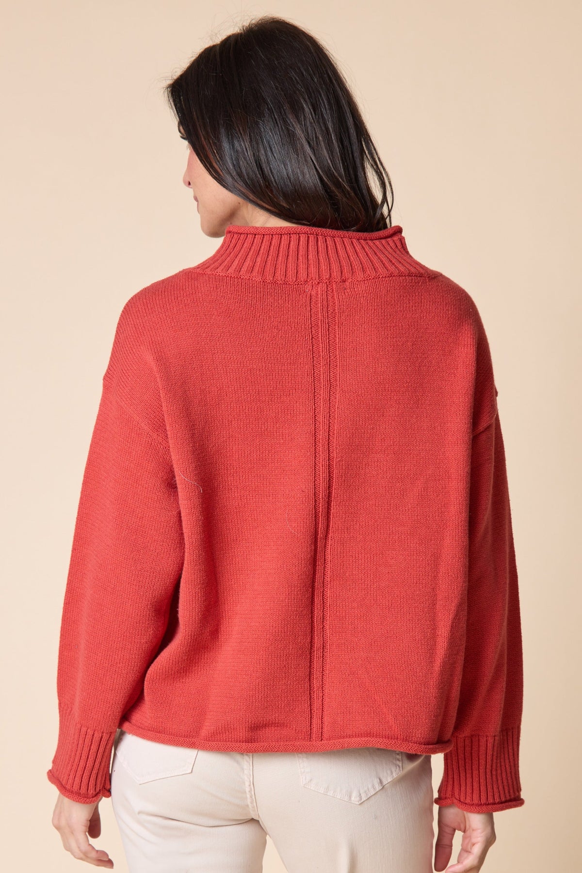 Back view of the Habitat Fireside Shaker Cozy Cabin Sweater in sienna with center back seam