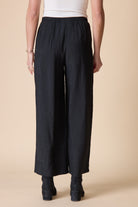 Back view of the Habitat Rayon Jacquard Button Hem Pant in black wide leg