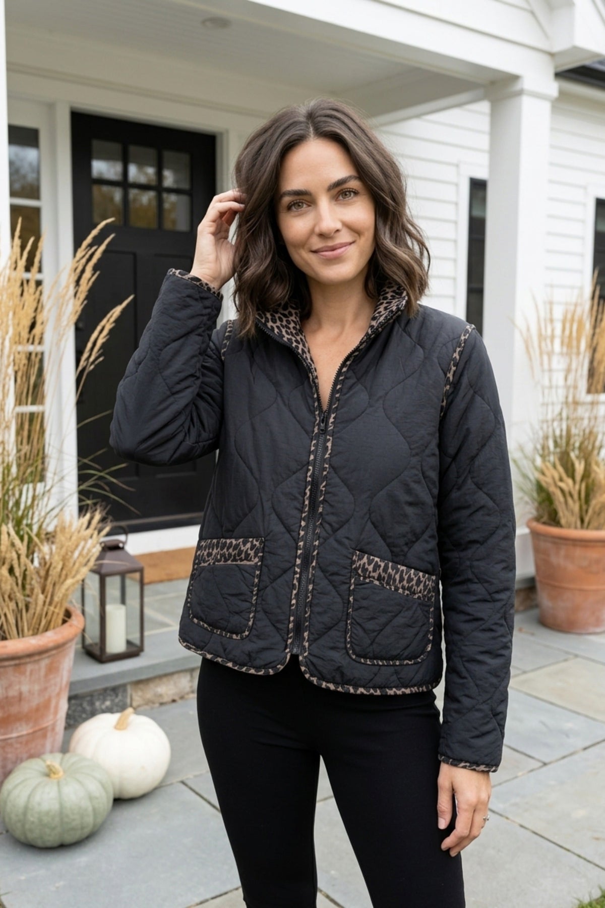 Habitat Reversible Print Quilt Puffer Coat in black with stand collar and print-trimmed patch pockets, styled outdoors for fall