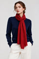 Model wearing the In Cashmere Classic Cashmere Scarf in Scarlet, a rich red 100% cashmere