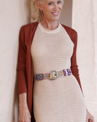 Close-up of the Jenny Krauss Folklorica cream embroidered wool belt being worn