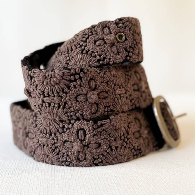 Jenny Krauss Midnight Oasis Embroidered Wool Belt in chocolate brown, coiled to show the hand embroidery