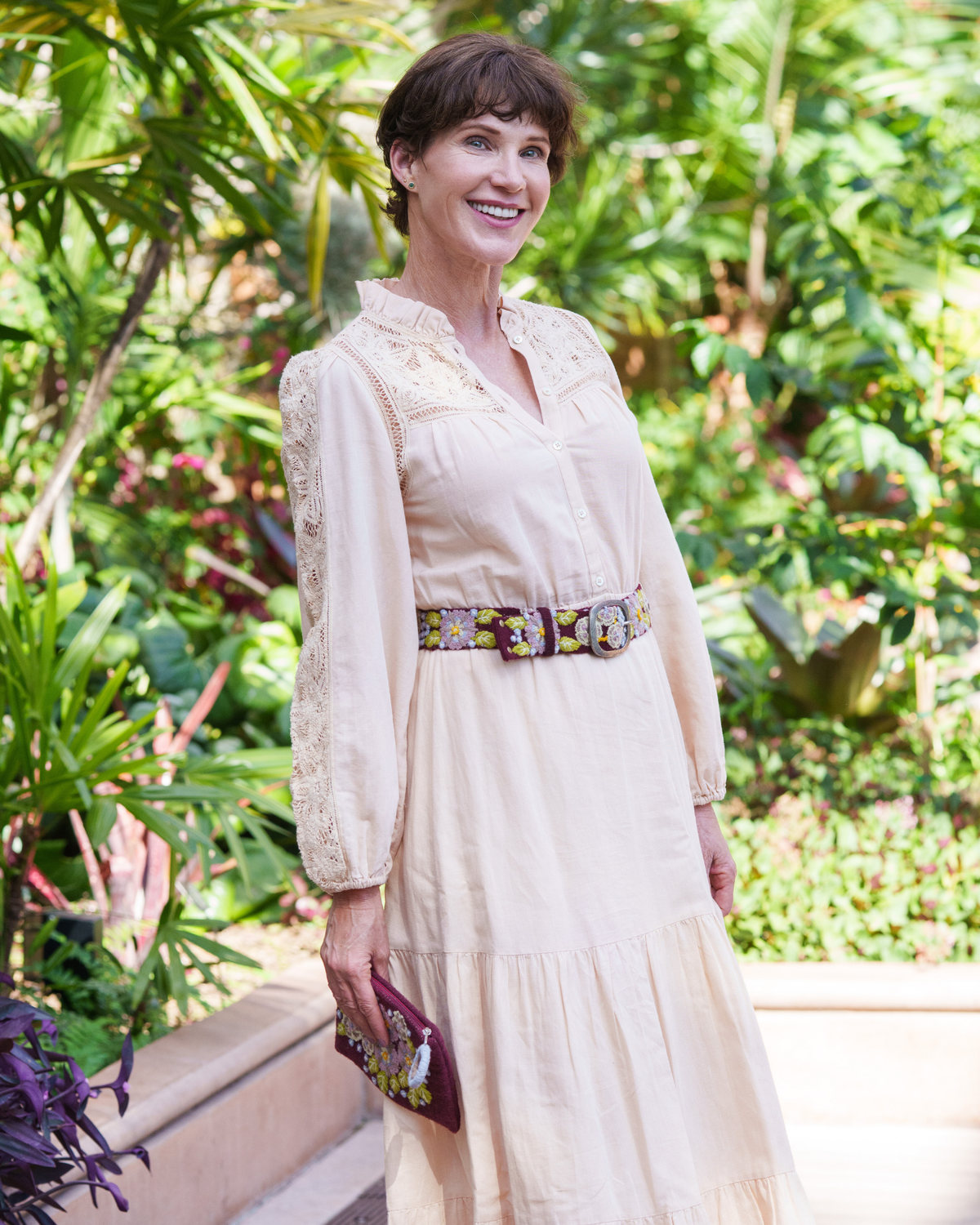 Model wearing the Jenny Krauss Morning Glory Floral Embroidered Wool Belt at the waist