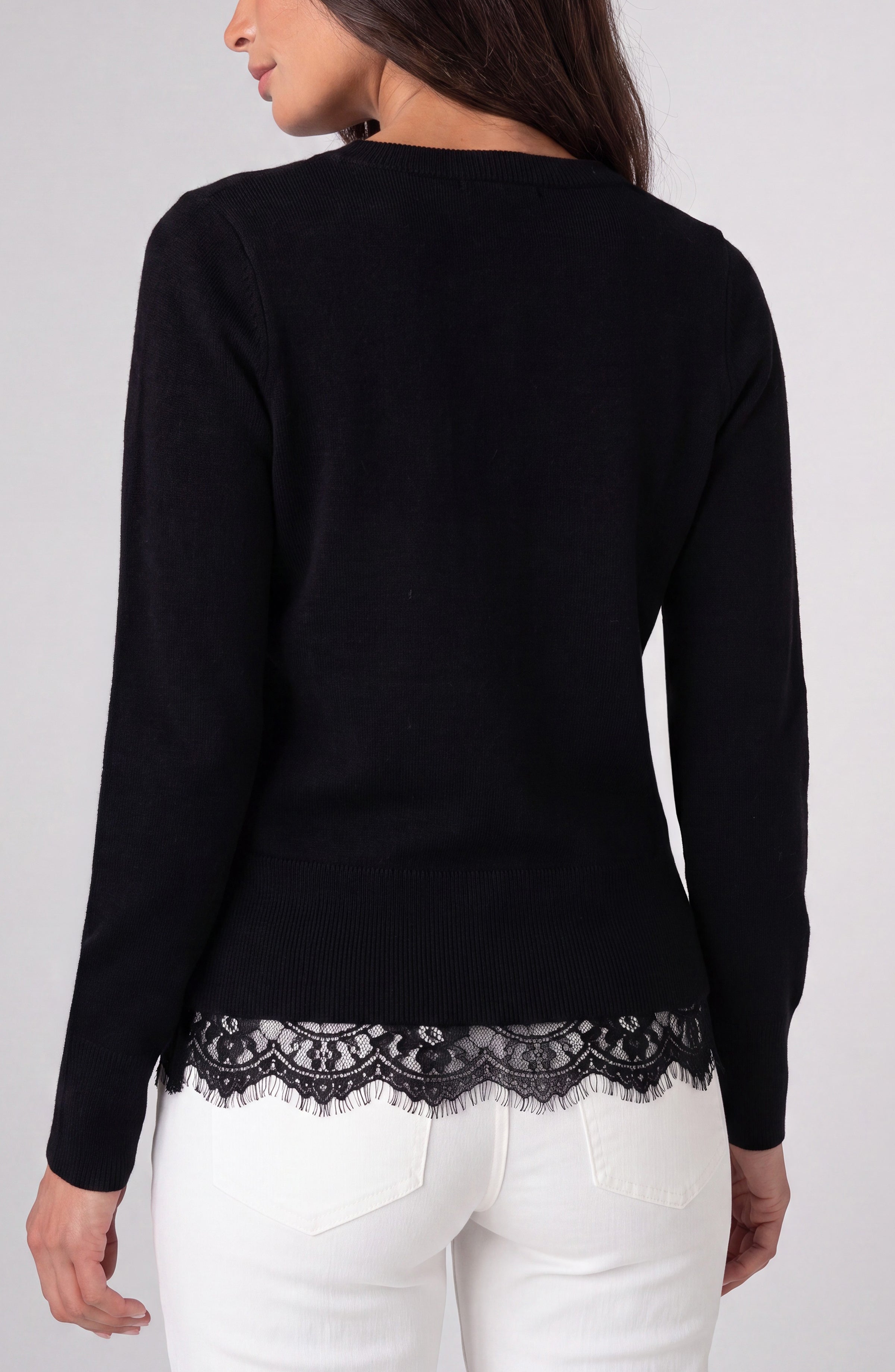 Back view of the black Liverpool lace trim V-neck sweater