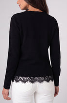 Back view of the black Liverpool lace trim V-neck sweater