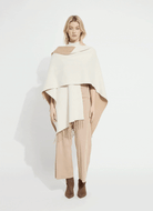 Lysse Basilia Double Face Reversible Wrap in Warm Biscuit Buttercream, worn with the buttercream side out
