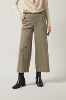 Lysse Clarke Wide Leg Denim in Everwood Sheen Line, styled with a cream drape-neck top