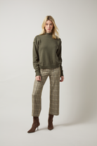Lysse Livia Crop Pant in Smoked Green Plaid, styled with an olive sweater