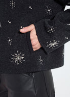 Detail view of the Lysse Scottie embellished jacket in charcoal