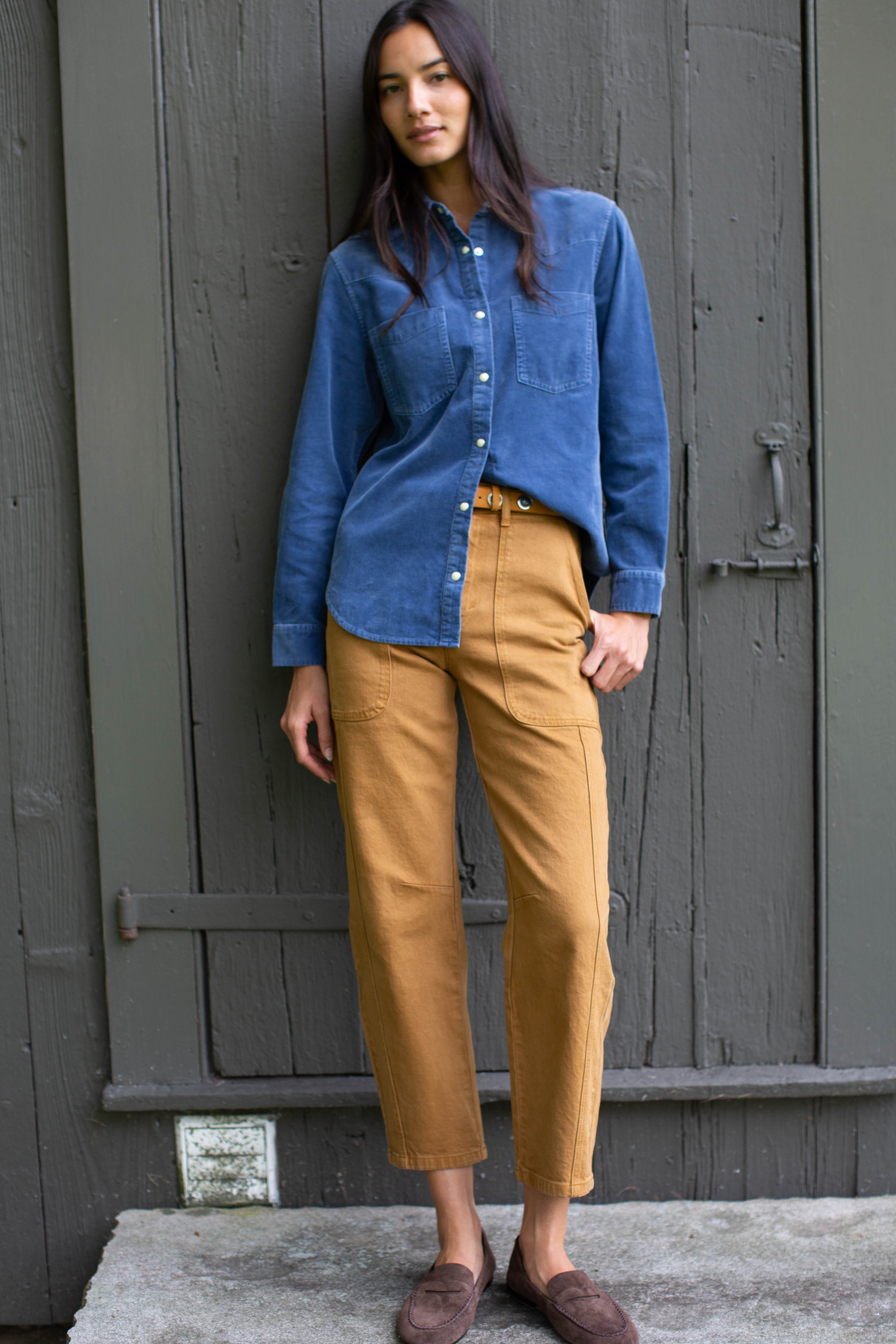 Marea Corduroy Western Shirt in Indigo, full-length view with camel pants and loafers