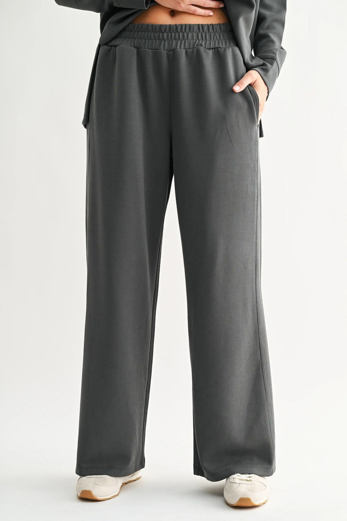 grey green wide leg sweatpants with white background