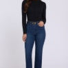 A woman modeling NYDJ Higher Rise Marilyn Ankle jeans in Afterhours dark indigo wash, paired with a black long-sleeve top, against a plain light studio background.