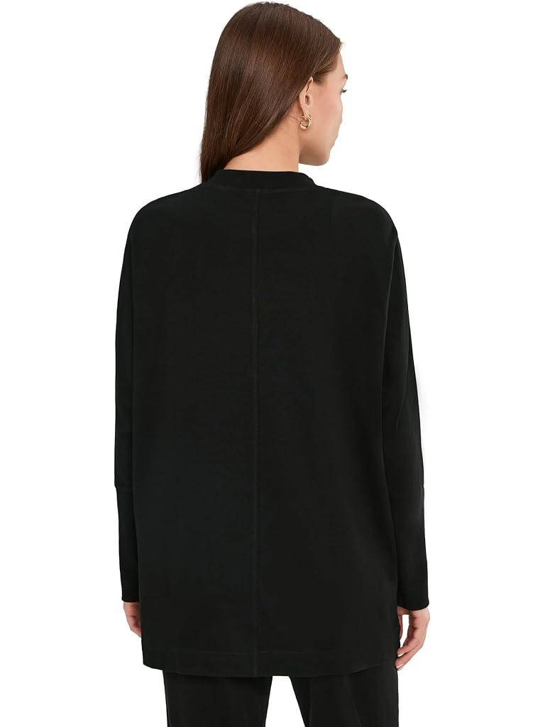 PACT Airplane Long Sleeve Poncho in black organic cotton, alternate view on model