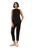 Pact Airplane Tapered Leg Pant in black organic cotton knit, front view